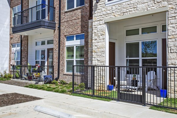 Modern patio with stylish outdoor seating at McKinney Terrace Apartments