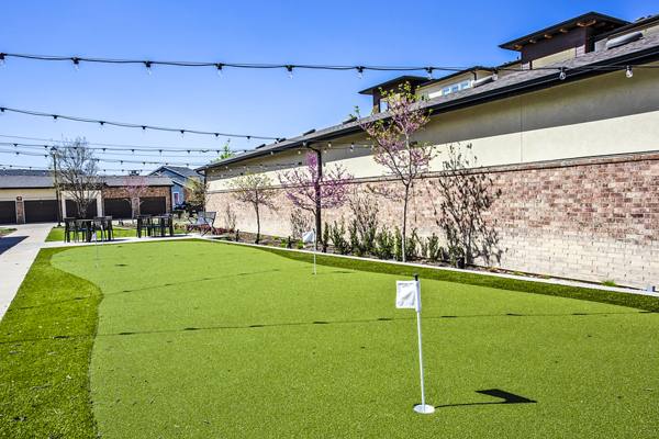 golf putting practice area at McKinney Terrace Apartments