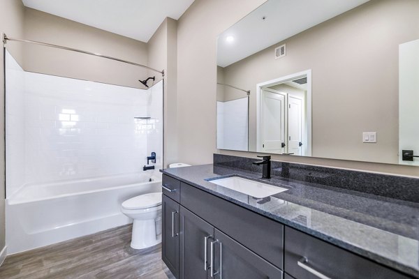 Luxurious bathroom with elegant finishes at The Premiere at Eastmark Apartments