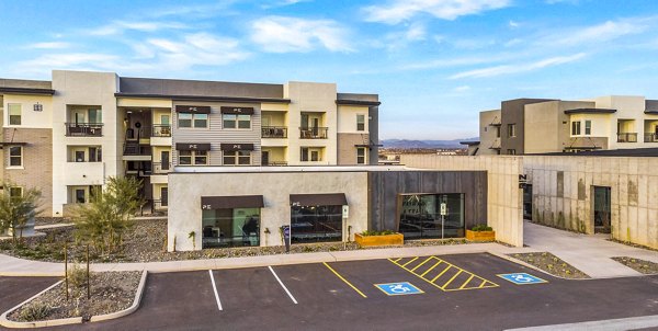 Modern clubhouse with elegant furnishings at The Premiere at Eastmark Apartments, ideal for relaxation and social gatherings