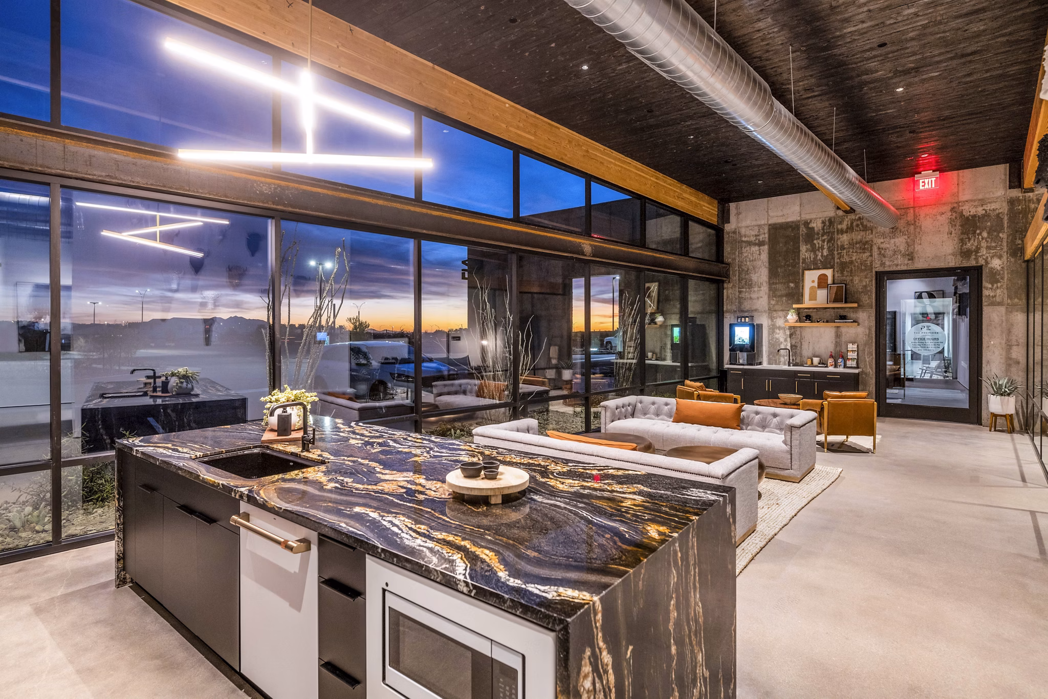 The Premiere at Eastmark: Contemporary clubhouse with modern decor and spacious seating