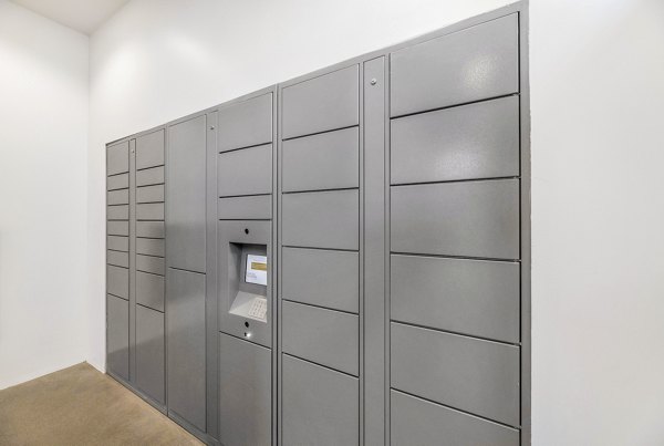 Parcel pickup lockers at The Premiere at Eastmark Apartments offer convenient package storage for residents