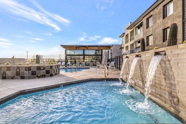 The Premiere at Eastmark: Luxury pool area offering peaceful relaxation for residents