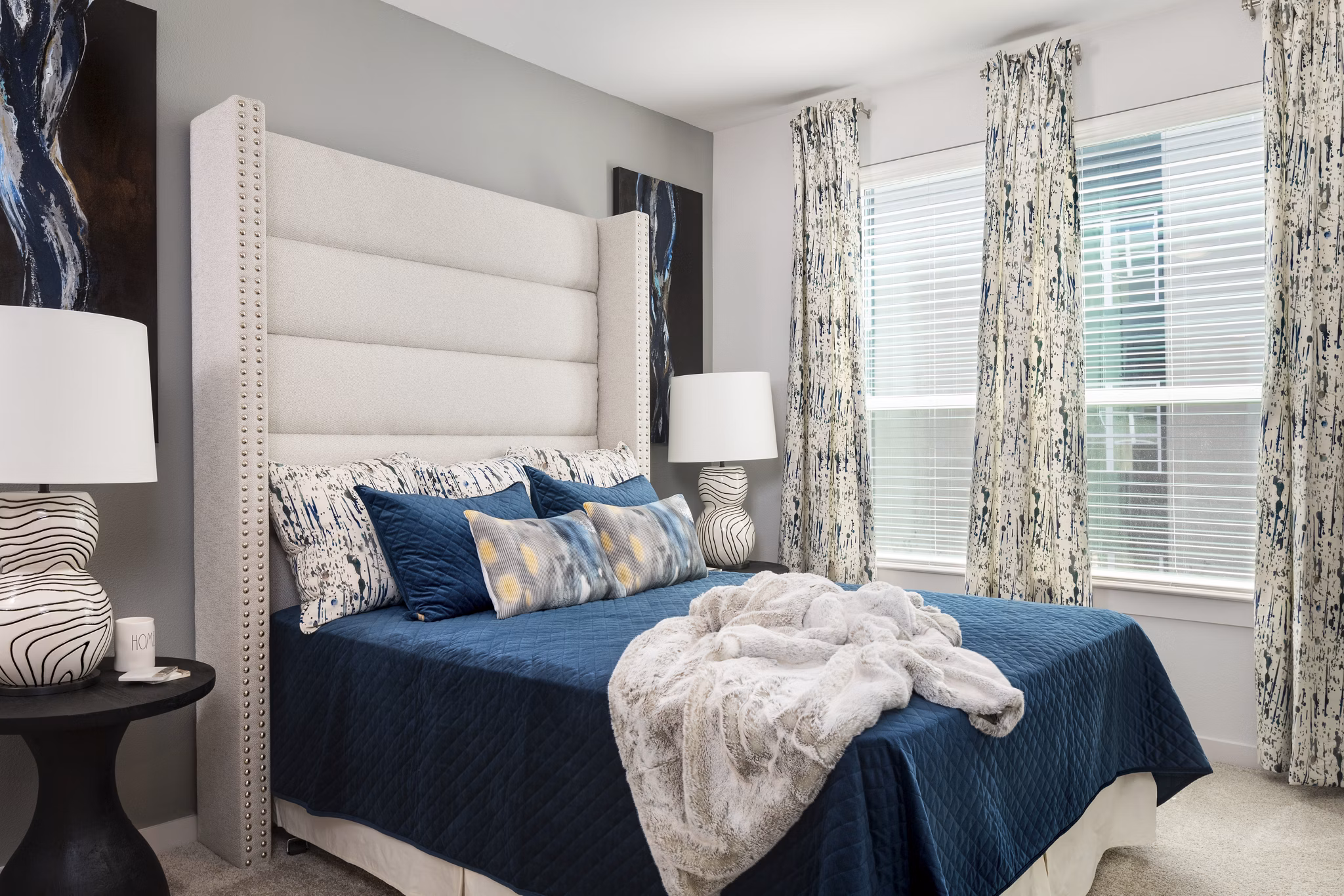 Cozy bedroom with elegant furnishings at Parkside at Round Rock Apartments