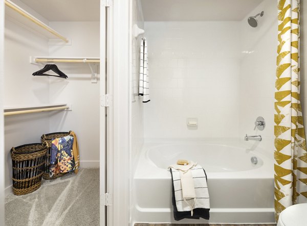 Modern bathroom with sleek fixtures at Parkside at Round Rock Apartments, featuring luxury finishes and spacious design