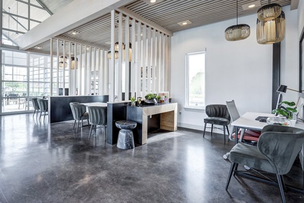 Home office with ergonomic desk and chair at Parkside at Round Rock Apartments