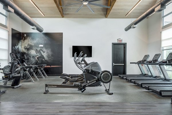 Expanded fitness center with modern equipment at Parkside at Round Rock Apartments