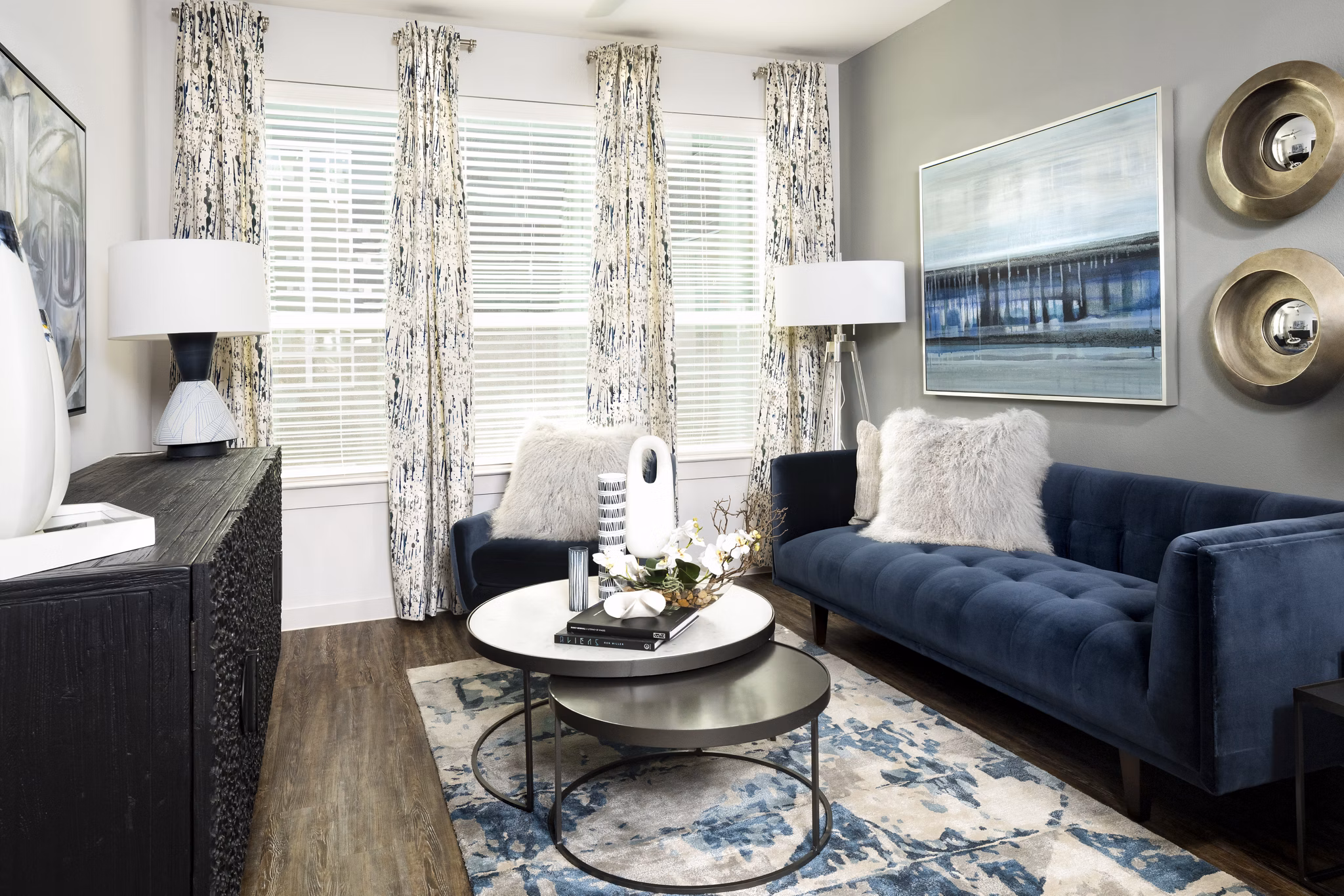 Spacious living room with modern furnishings in Parkside at Round Rock Apartments