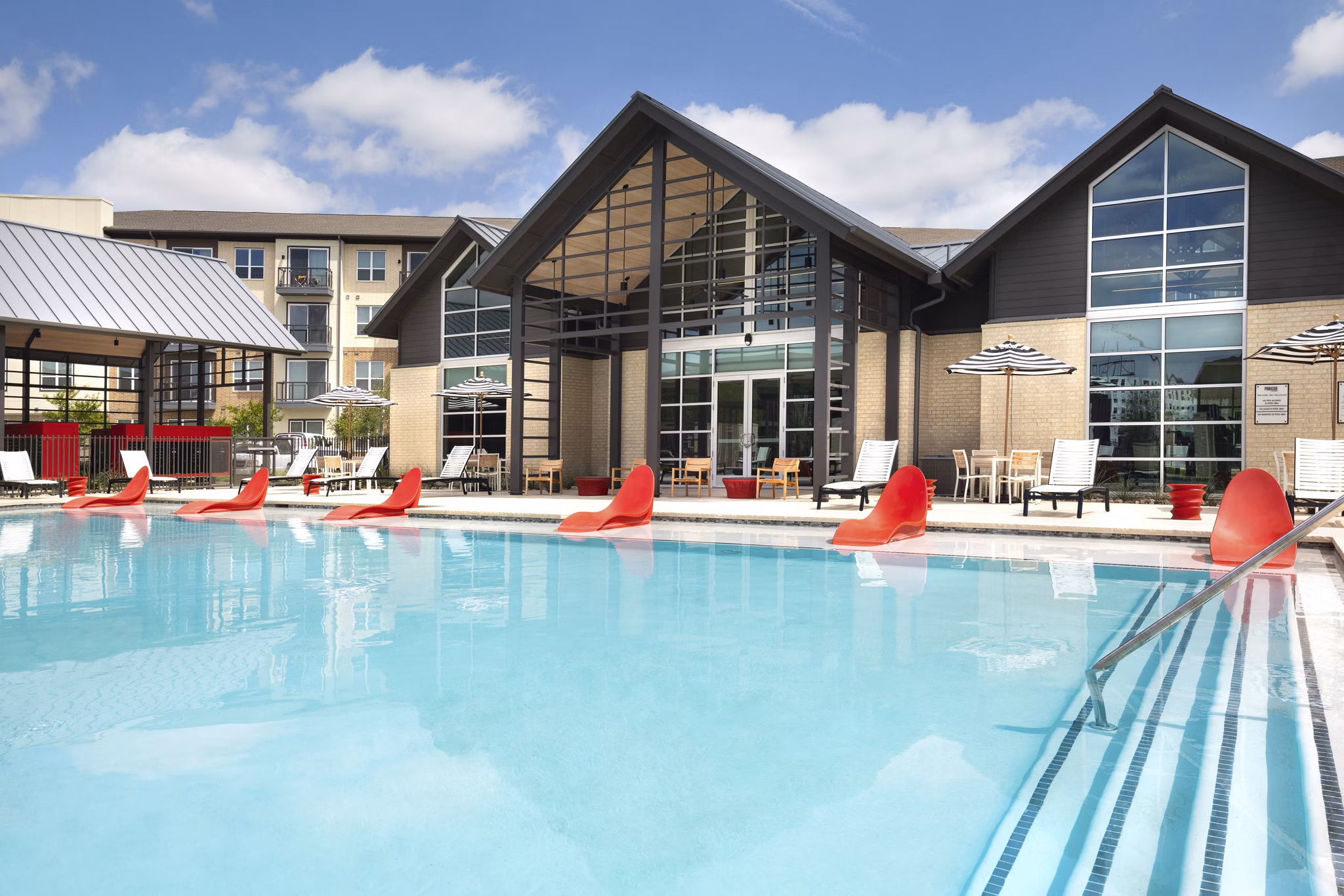 Sparkling outdoor pool at Parkside at Round Rock Apartments, ideal for relaxation and leisure activities