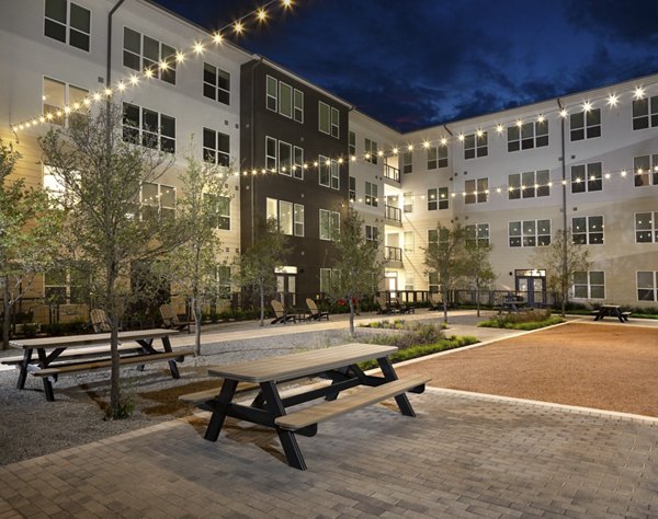 Peaceful courtyard with lush landscaping at Parkside at Round Rock Apartments