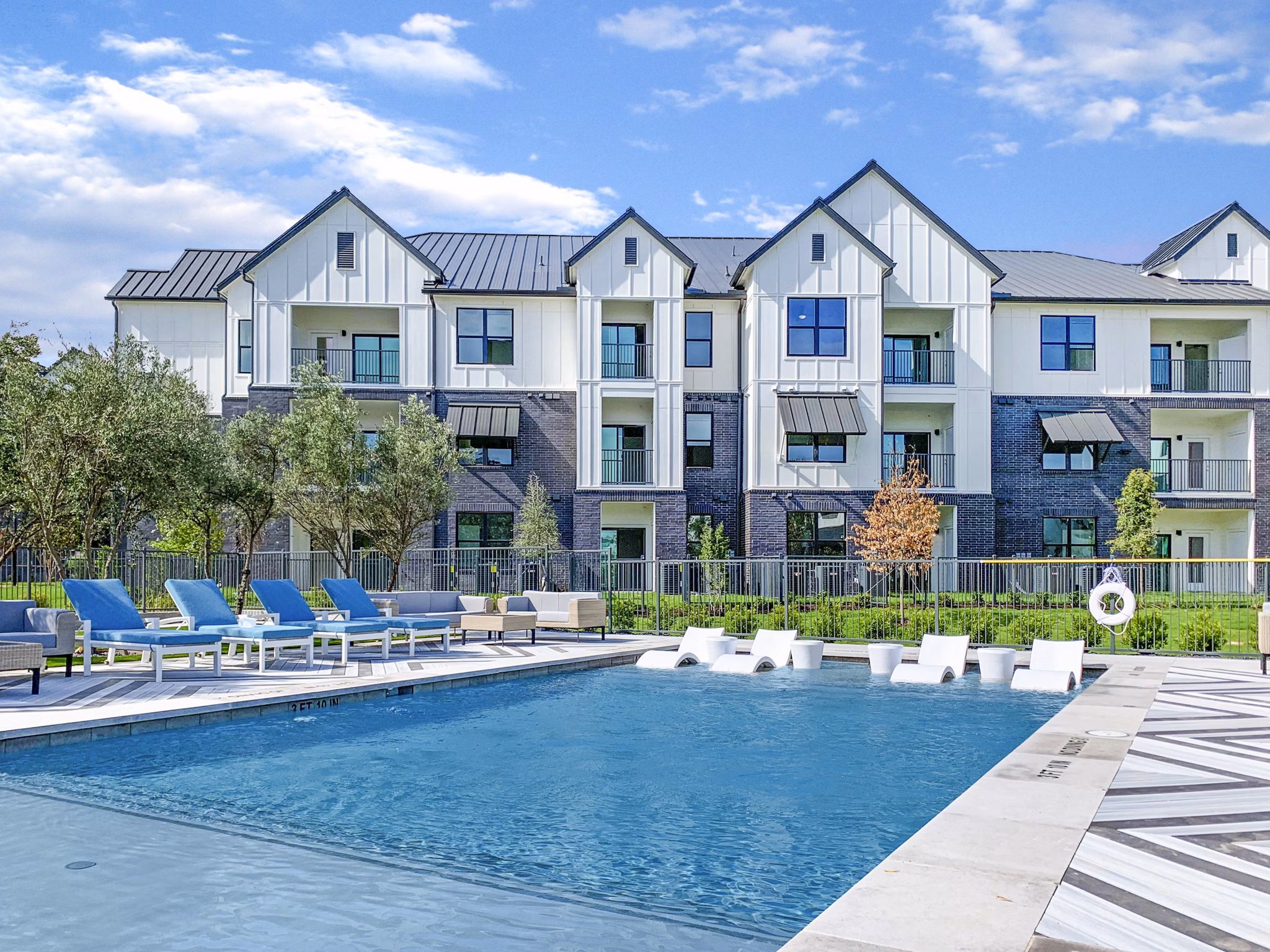 Rooftop pool offering scenic views at Vineyard Apartments