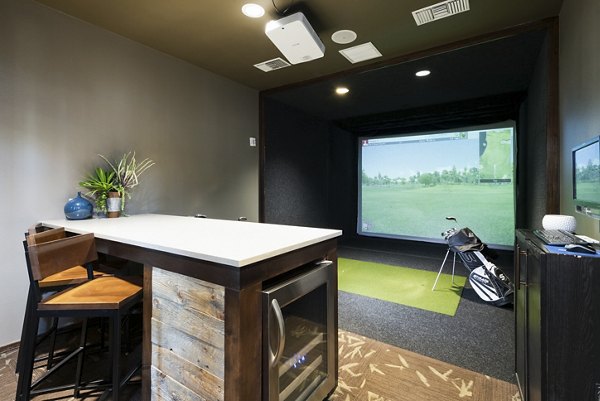 Modern clubhouse featuring social lounge and fireplace at The Trails at Timberline Apartments