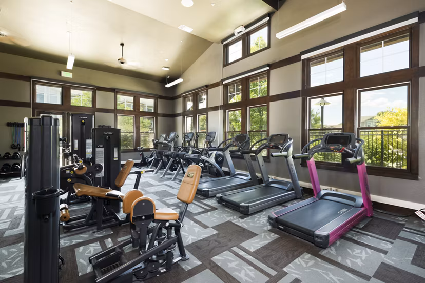 fitness center at The Trails at Timberline Apartments 