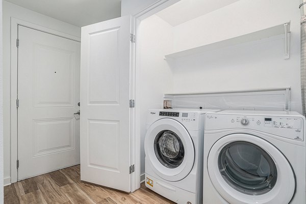 laundry facility at The Trails at Timberline Apartments 