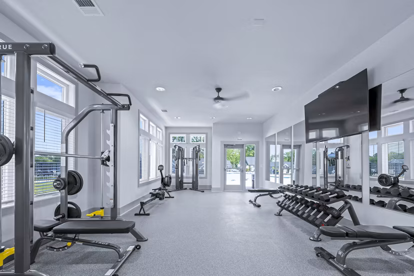 Modern fitness center with state-of-the-art equipment at Wayford at Innovation Park Apartments