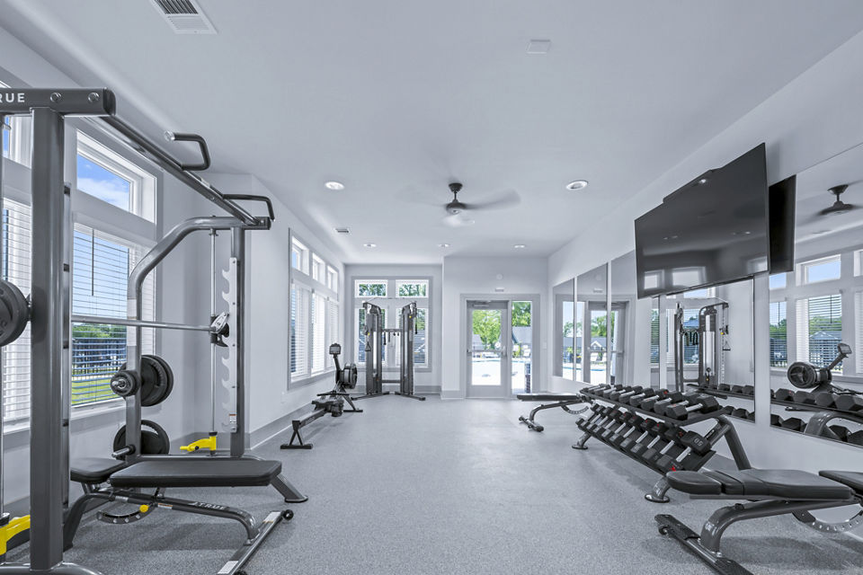 Modern fitness center with state-of-the-art equipment at Wayford at Innovation Park Apartments