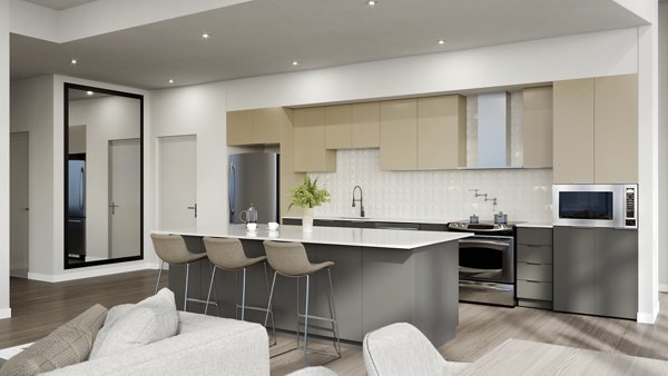 Modern kitchen with stainless steel appliances at Shoreline Gateway Apartments