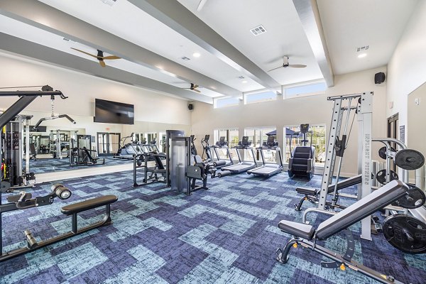 Modern fitness center with state-of-the-art equipment at Ltd Med Center Apartments for active lifestyles