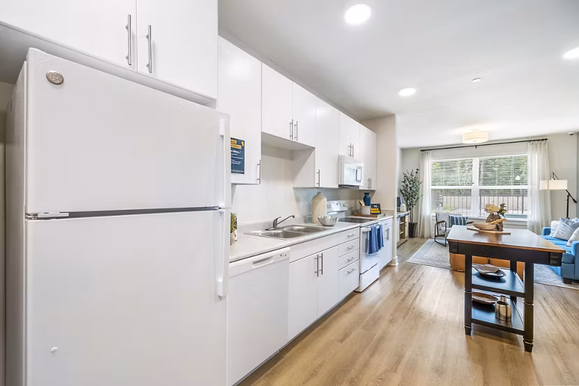 Modern kitchen featuring stainless steel appliances at Ltd Med Center Apartments