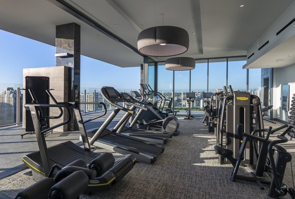 State-of-the-art fitness center with modern equipment at Stanza Little Italy Apartments in San Diego