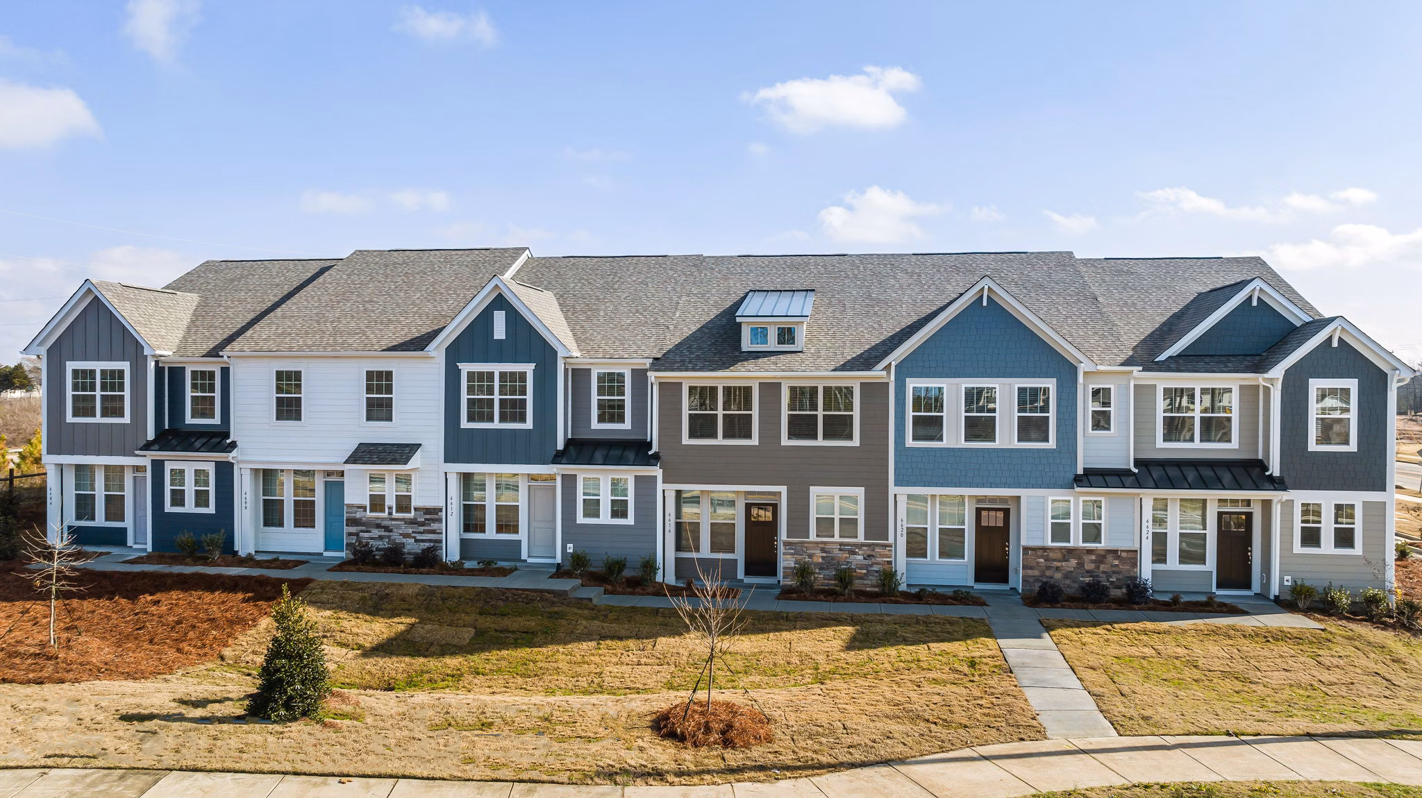 ABODE at Parkside: Contemporary townhome apartments with stunning architecture in a vibrant community setting