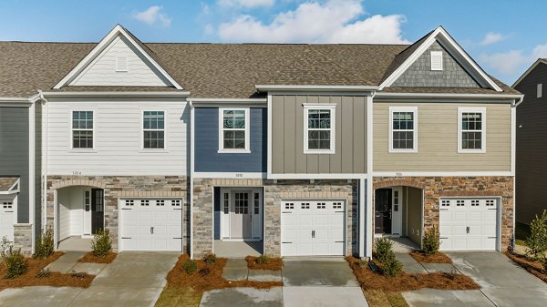 ABODE at Parkside: Elegant apartment townhomes with lush landscaping in a peaceful neighborhood