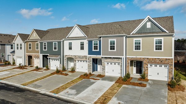 ABODE at Parkside Apartment Townhomes: Modern apartment building with landscaped gardens