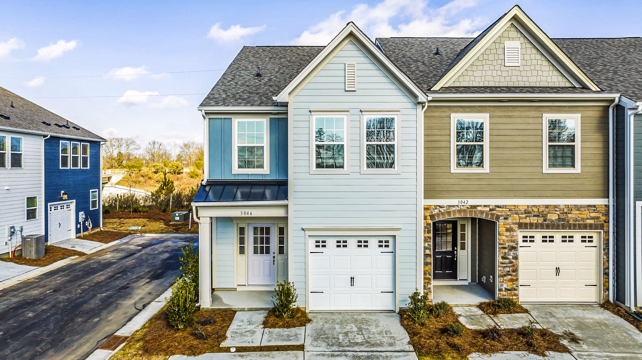 ABODE at Parkside: Modern townhome apartment in a serene neighborhood
