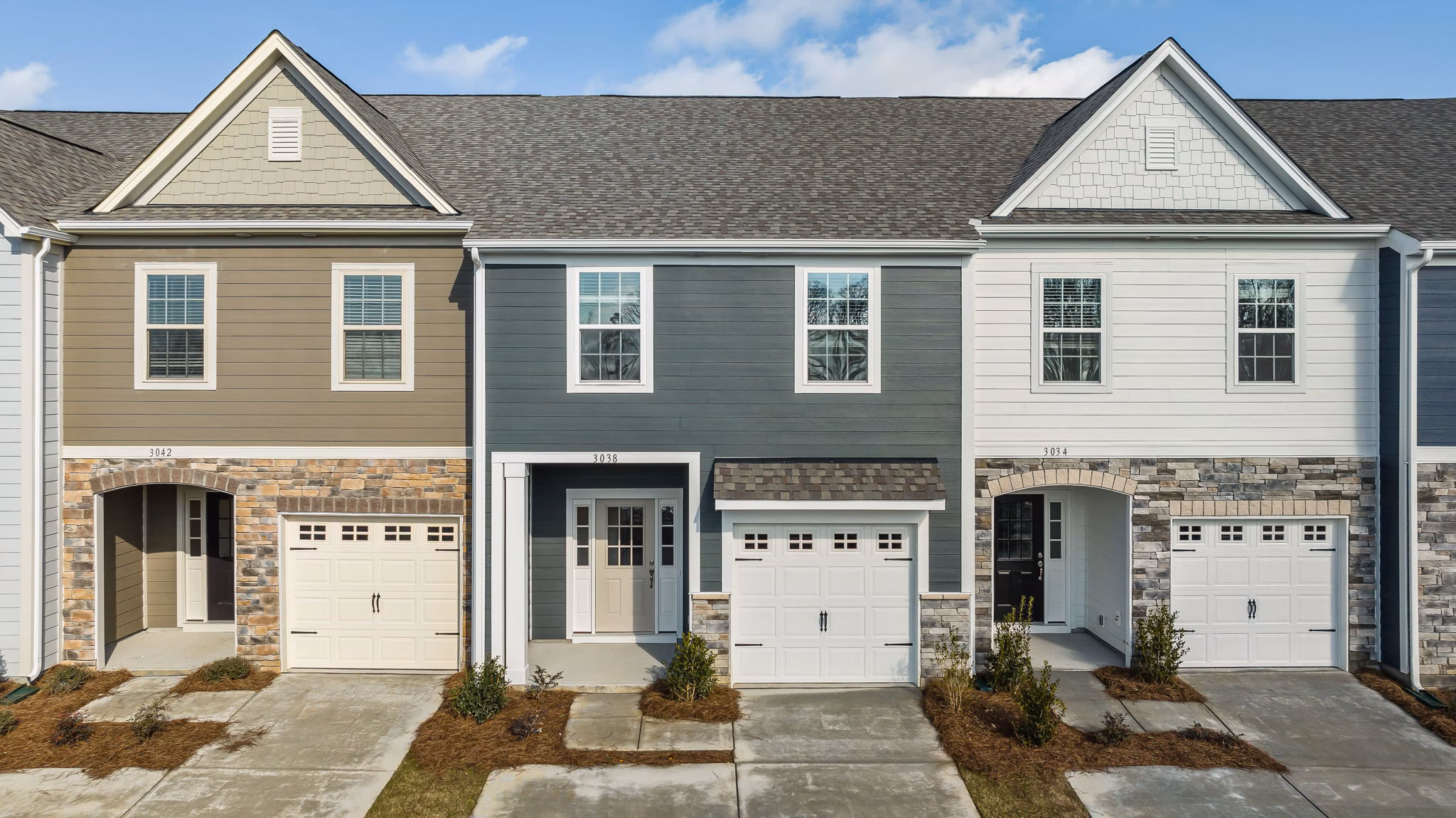 ABODE at Parkside: Contemporary apartment townhomes with landscaped in city setting