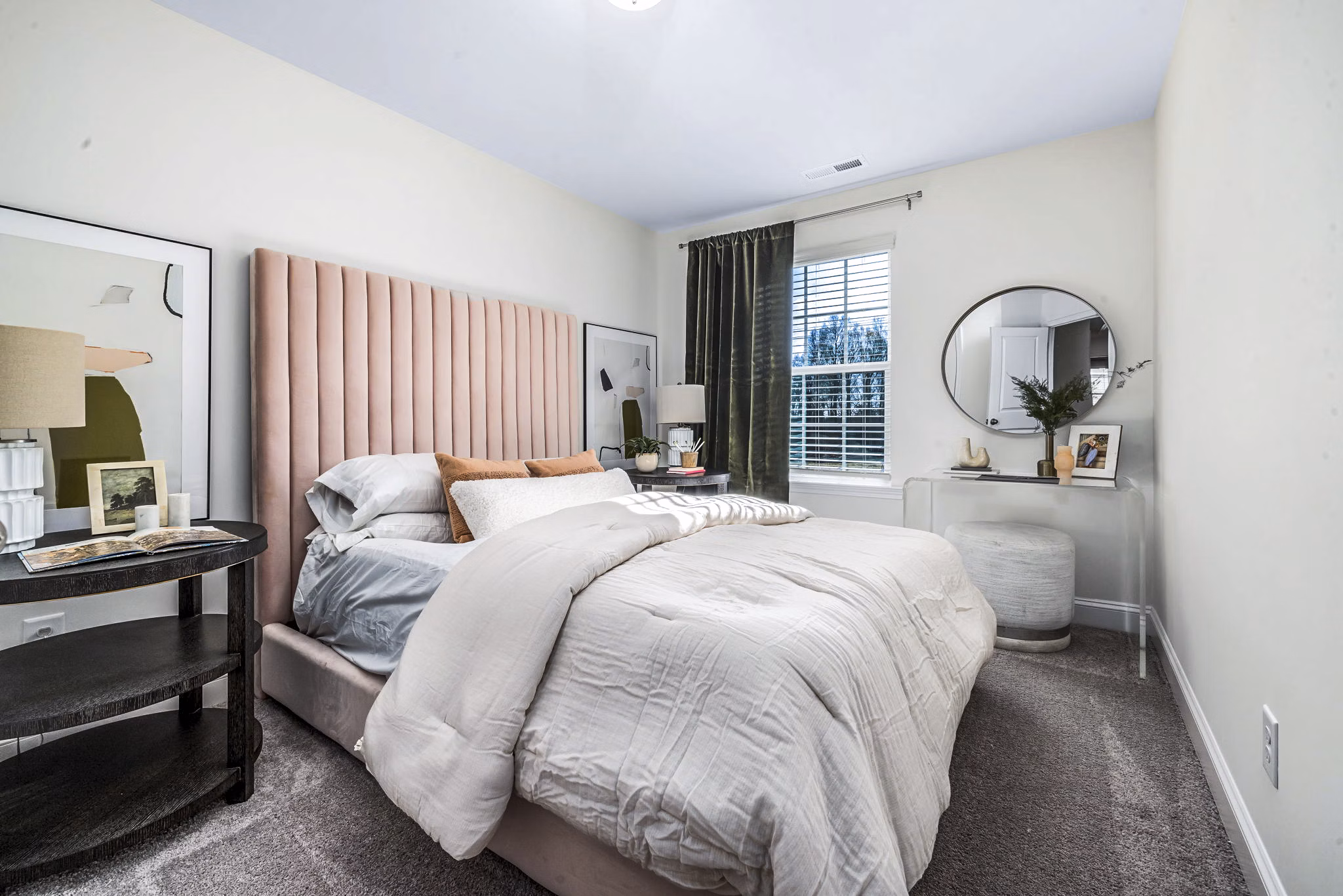 Cozy bedroom with modern decor at ABODE at Parkside Apartment Townhomes, offering luxury living in a tranquil setting