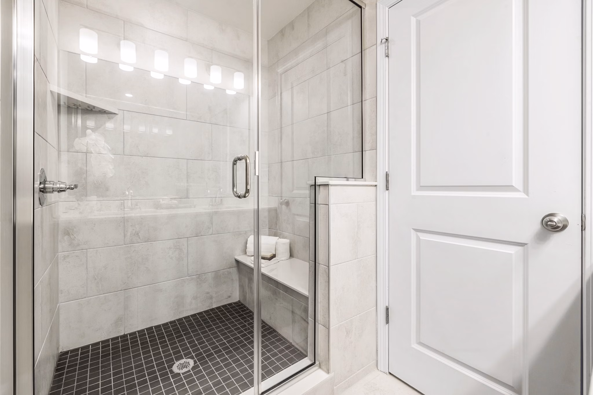 Modern bathroom with sleek fixtures at ABODE at Parkside Apartment Townhomes