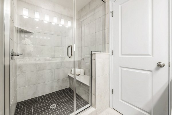 Modern bathroom with sleek fixtures at ABODE at Parkside Apartment Townhomes