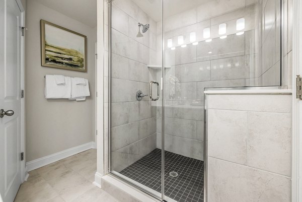 Spacious bathroom with modern fixtures in ABODE at Parkside Apartment Townhomes, featuring luxury apartments in a serene neighborhood