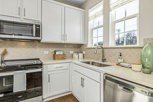 Spacious kitchen with modern appliances at ABODE at Parkside Apartment Townhomes