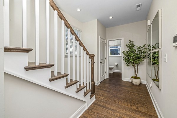 bath and stairway at ABODE at Parkside Apartment Townhomes