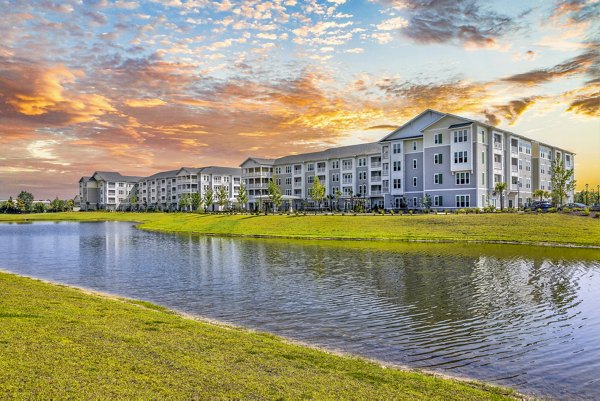 building/exterior at The Grove at Coastal Grand Apartments