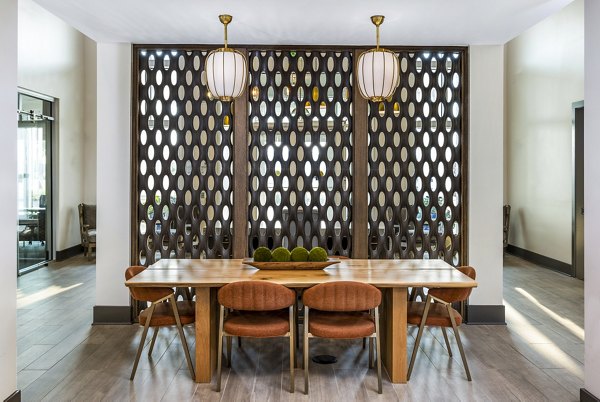 Clubhouse lobby with modern decor at The Grove at Coastal Grand Apartments