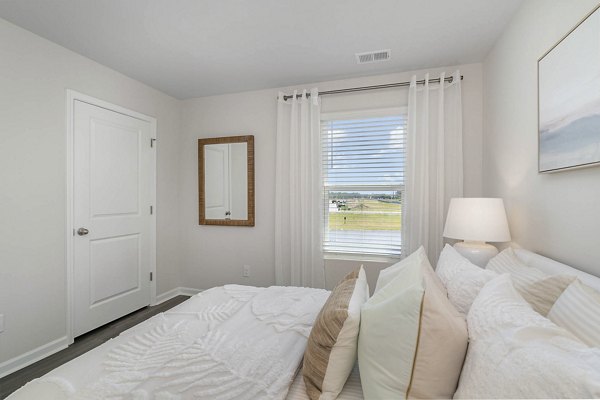 bedroom at The Grove at Village Oaks Apartments