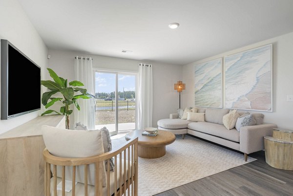 living room at The Grove at Village Oaks Apartment Homes