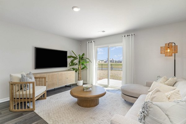 living room at The Grove at Village Oaks Apartment Homes