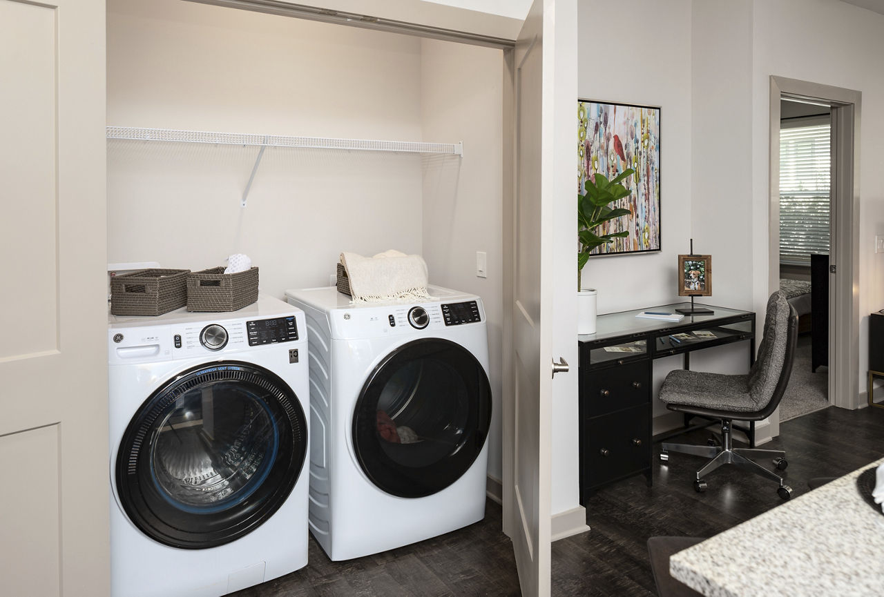Laundry room at Wrenstone At The Highlands Apartments