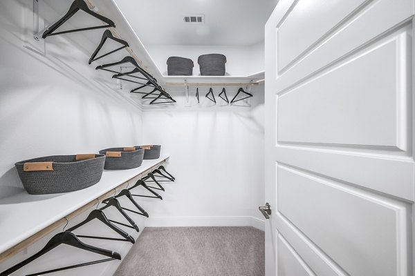 Cozy bedroom with stylish decor at Starling at Bridgeland Apartments