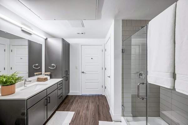 Modern bathroom with sleek fixtures at Starling at Bridgeland Apartments
