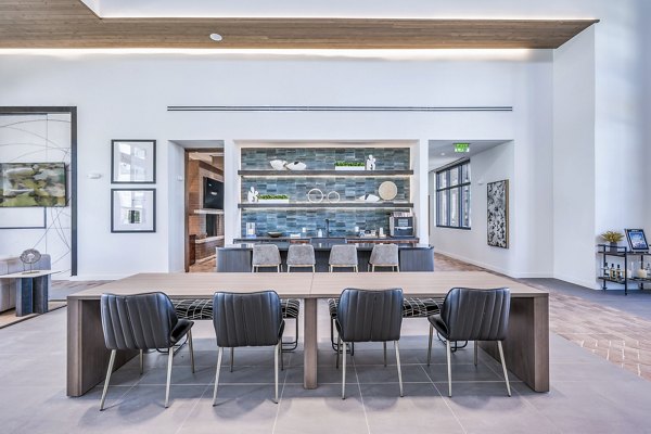 Modern clubhouse with stylish seating and community spaces at Starling at Bridgeland Apartments