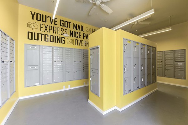 Modern mail room with parcel lockers at FLATZ 520 Apartments