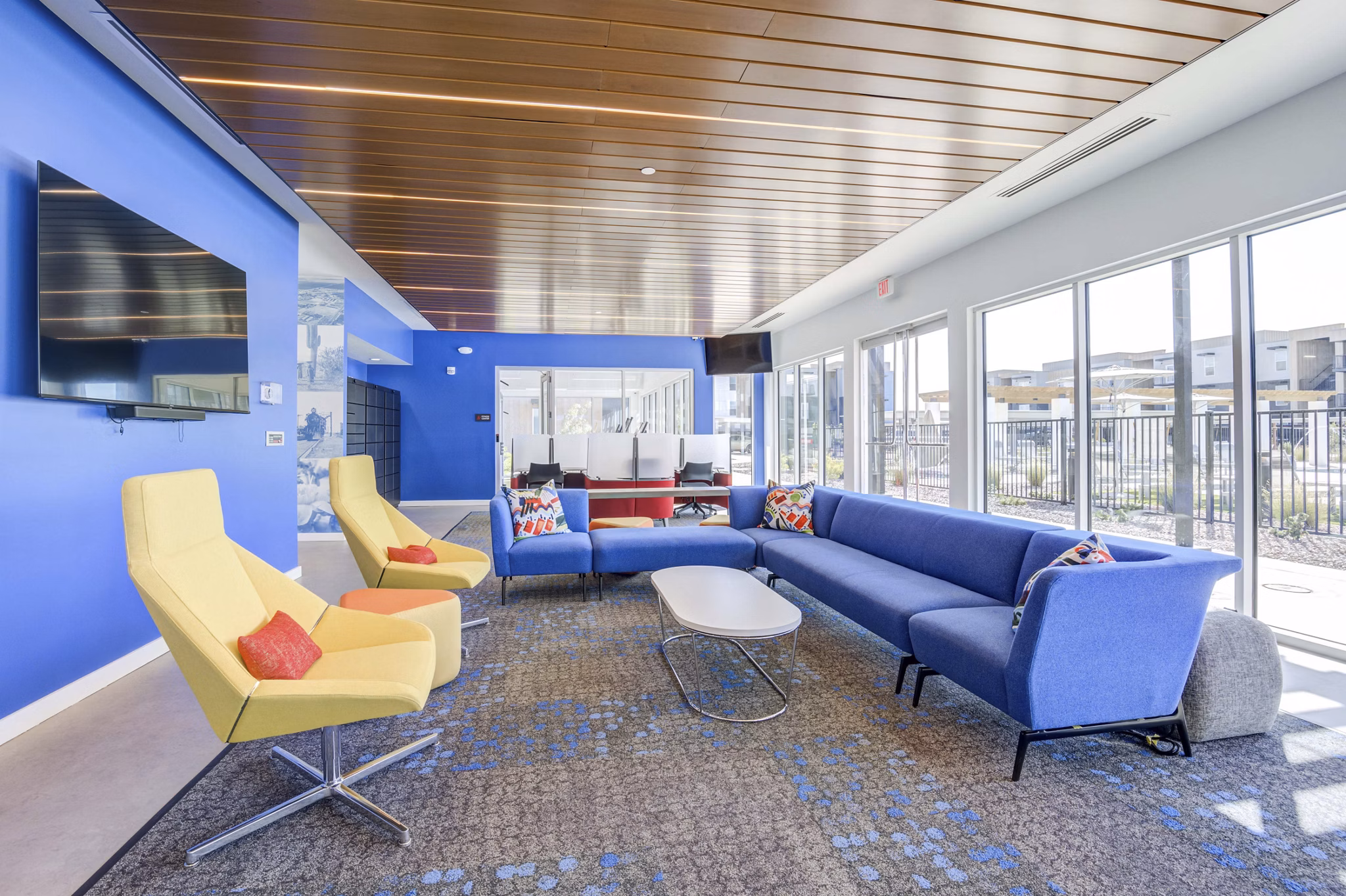 Modern clubhouse with chic seating and natural light at FLATZ 520 Apartments