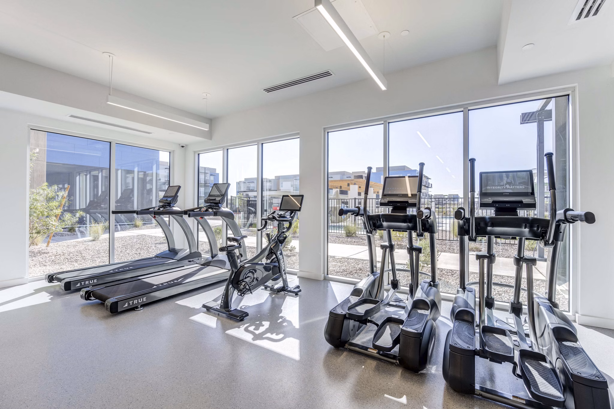 Modern fitness center with state-of-the-art equipment at FLATZ 520 Apartments, luxury living by Greystar in vibrant downtown area