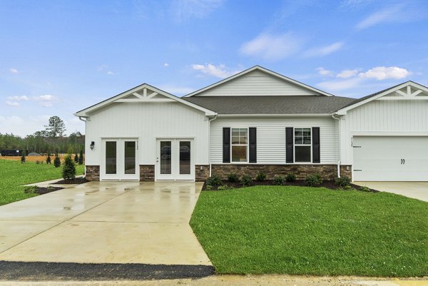 Maple Grove Apartments: Contemporary luxury apartment with lush landscaping in vibrant city center