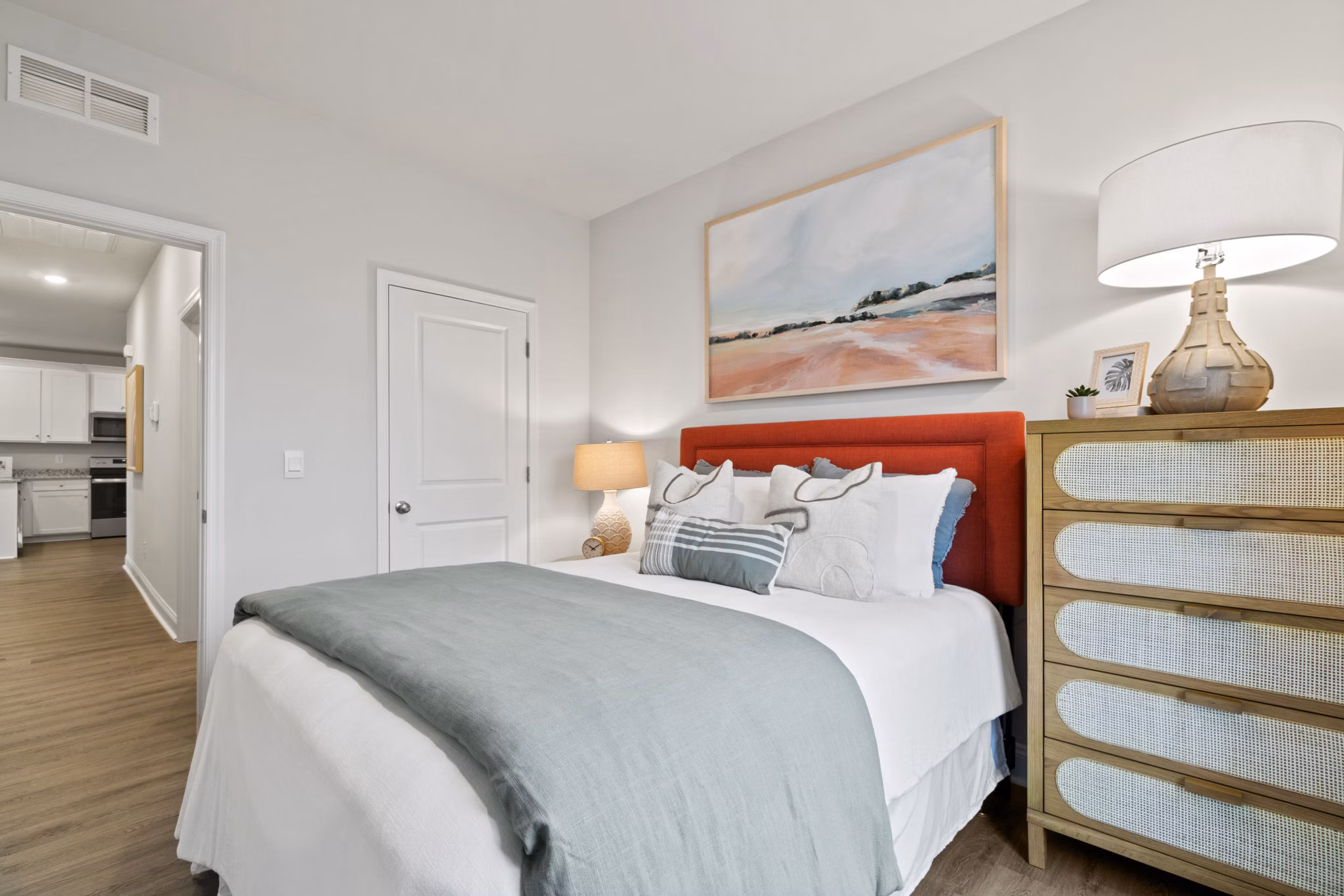 Cozy bedroom featuring modern decor at Maple Grove Apartments
