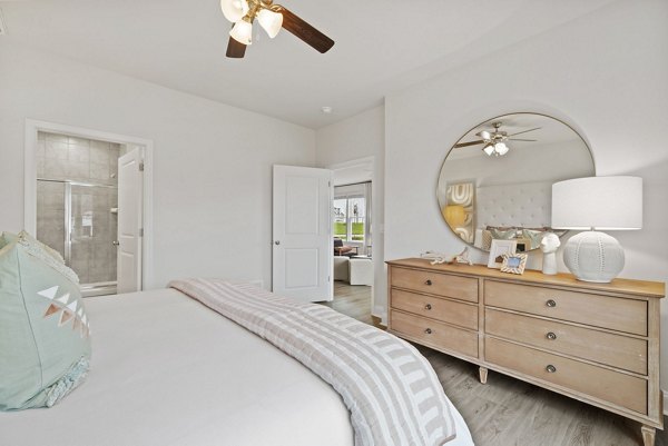 Elegant bedroom with modern decor at Maple Grove Apartments